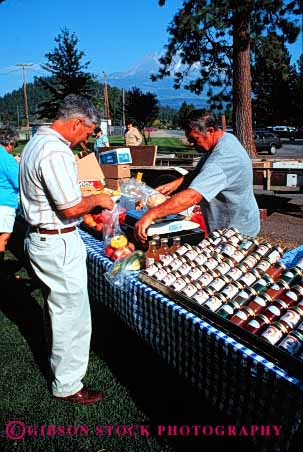 Stock Photo #2447: keywords -  agriculture colorful commerce crop customer display farmers food fruit jar market merchandise outdoor produce product retail sell stand vegetable vert