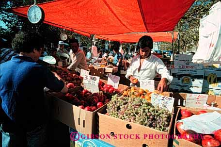 Stock Photo #2448: keywords -  agriculture colorful commerce crop display ethnic farmers food fruit grape horz market merchandise minority produce product retail sell stand vegetable