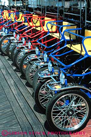 Stock Photo #6137: keywords -  bicycle bicycles bike color colorful disneyworld drive machine pattern peddle rent rental ride roll row symmetrical symmetry vehicle vert wheel wheels