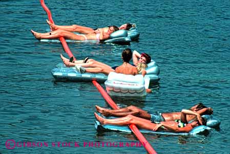 Stock Photo #2452: keywords - air float horz lake mattress not outdoor relax released skin summer sun sunbath sunburn sunshine tan tanning vacation warm