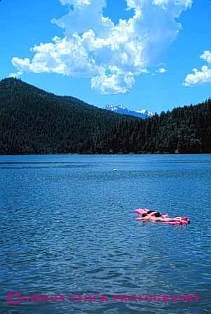 Stock Photo #2455: keywords -  air applegate float lake mattress mountain oregon outdoor relax skin summer sun sunbath sunburn sunshine swim tan tanning vacation vert warm women