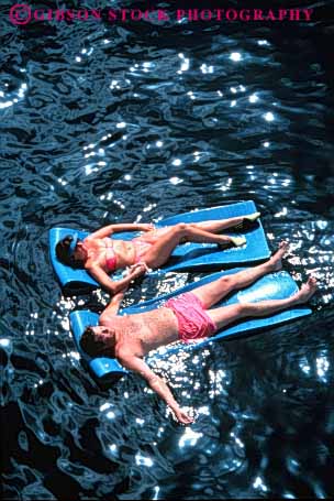 Stock Photo #3563: keywords - affection bath caribbean couple easy float hands hold husband islands love man mate private quiet recreation relax released share solitude suit summer sunbath together travel tropical vacation vert virgin warm water wife woman