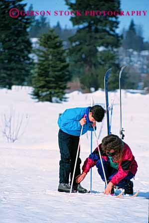 Stock Photo #2471: keywords - boy child family female help mother nordic parent released single ski snow son sport teach together vert wife winter woman