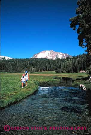 Stock Photo #2476: keywords -  adventure california child daughter family female girl green hike landscape lassen mother mountain national outdoor parent park recreation released river scenic single stream summer together vert walk warm wife wilderness woman