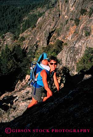 Stock Photo #2477: keywords -  adventure baby backpack caution child climb family female happy health mother parent released risk rock single smile strength summer together vert warm wife woman