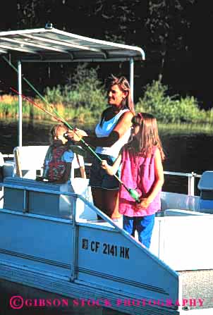 Stock Photo #2481: keywords -  boat child children daughter family female fish fishing girl lake mother parent pole recreation released single sport summer together vacation vert warm wife woman