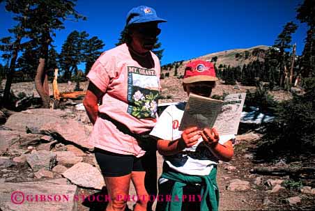 Stock Photo #2494: keywords -  adventure child daughter explore family female guide hike horz learn mother parent read recreation released single sport summer together trail vacation walk wife woman