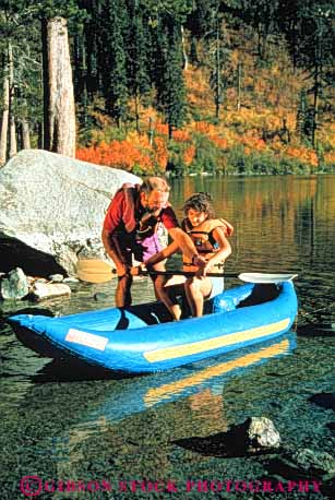 Stock Photo #3377: keywords -  autumn boat daughter families father lake learn paddle play raft released skill sport teach together vert water