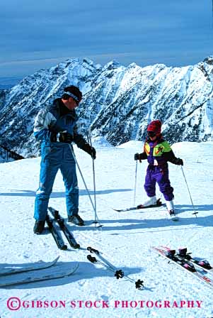 Stock Photo #2497: keywords -  child dad daughter father girl learn mountain not outdoor parent practice released single ski snowbird sport teach together utah vert winter