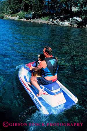 Stock Photo #2499: keywords -  adventure boat boy child dad daughter father flotation girl jet jumper lake not outdoor parent released single ski son sport together vert water wave