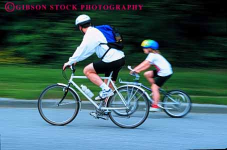 Stock Photo #2508: keywords -  action bicycle blur child dad daughter father girl horz motion not outdoor parent released single speed sport summer together