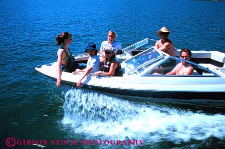 Stock Photo #6133: keywords -  action blur boat boating boy child children dad daughter dynamic enjoy father fathers girl horz husband lake men move movement offspring play recreation released share sibling speed splash summer thrill together travel trip vacation vessel water