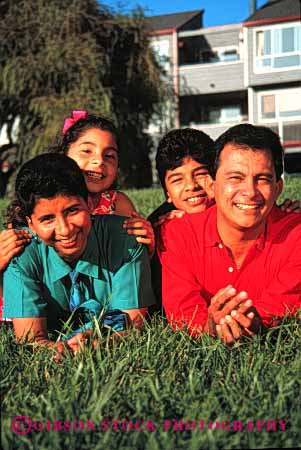 Stock Photo #2522: keywords -  children daughter ethnic families family father group happy hispanic lawn mexican minority mother parent portrait released smile son together vert