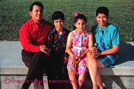 Stock Photo #2525: keywords - children daughter ethnic families family father group happy hispanic horz mexican minority mother parent portrait released sit son together