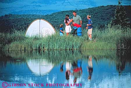 Stock Photo #3361: keywords -  adventure backpacking california camp child cooperation exercise families family father horz husband lake mother mount outdoor reflection released shasta sport summer tent together wife