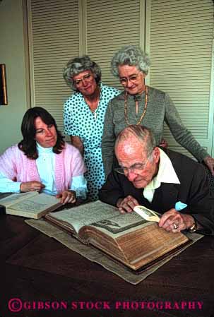 Stock Photo #2542: keywords -  book daughter family father generations grandchild granddaughter grandfather heritage lineage mother parent released reunion study three together tree vert