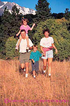 Stock Photo #2543: keywords -  child children exercise family father fitness jog jogging mother motion movement outdoor parent recreation released run speed sport summer team together vert wilderness