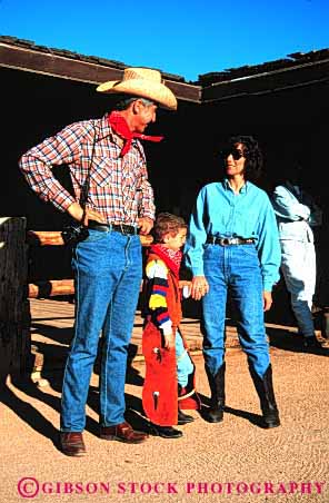 Stock Photo #2551: keywords - adventure child costume cowboy dude family father guest mother only outfit parent play ranch recreation released son theme together vacation vert west western