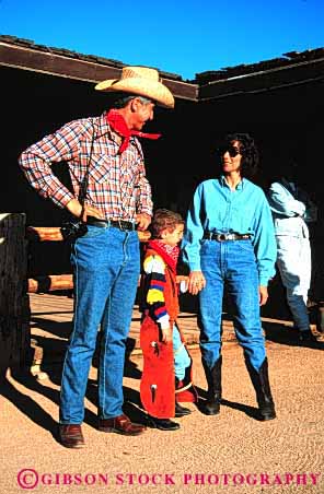 Stock Photo #2551: keywords -  adventure child costume cowboy dude family father guest mother only outfit parent play ranch recreation released son theme together vacation vert west western