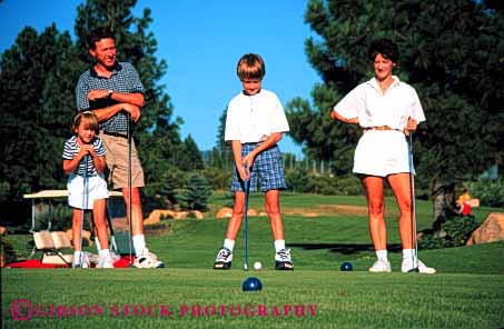 Stock Photo #2553: keywords -  child children daughter family father golf horz learn mother parent play practice recreation released son sport summer teach together warm