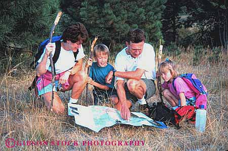 Stock Photo #2557: keywords -  adventure child children compass explore family father hike horz learn map mother navigate outdoor parent recreation released summer together warm wilderness