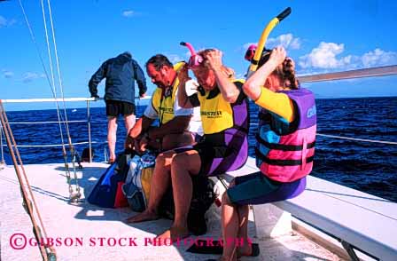 Stock Photo #2560: keywords -  boat child children dive family father flotation hawaii horz mother parent recreation released safety snorkel summer together travel vacation vest warm