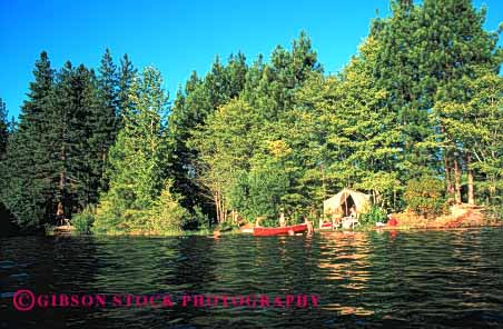 Stock Photo #2565: keywords -  alone camp canoe children family forest horz lake landscape parent play private quiet recreation released solitude tent together tree vacation water wilderness