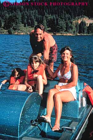 Stock Photo #6631: keywords -  boat boating child children family father float flotation fun girl girls group husband lake life lifejacket mother outdoor outside peddle plastic play portrait recreation released safe safety share sport summer synthetic together travel trip vacation vert vest vests water wife youth