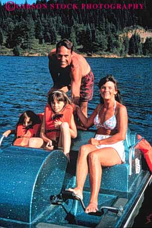 Stock Photo #6631: keywords - boat boating child children family father float flotation fun girl girls group husband lake life lifejacket mother outdoor outside peddle plastic play portrait recreation released safe safety share sport summer synthetic together travel trip vacation vert vest vests water wife youth
