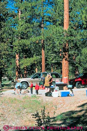 Stock Photo #12600: keywords -  camp camper campers camping camps charleston children families family forest mt nevada outdoor outside parents people recreation released tree trees vert