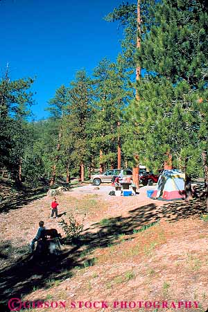Stock Photo #12601: keywords - camp camper campers camping camps charleston children families family forest mt nevada outdoor outside parents people recreation released tree trees vert
