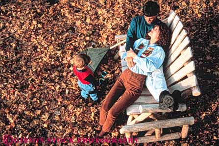 Stock Photo #3362: keywords - affection autumn calm child fall families family father home horz husband leaves love mother outdoor relax released security together well-being wife