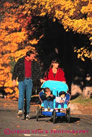 Stock Photo #2575: keywords -  autumn children exercise fall family hike outside released share street stroller together vert walk