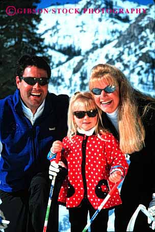 Stock Photo #2578: keywords - child country cross family father fun girl mother nordic parent play portrait recreation released share ski snow sport together vert winter