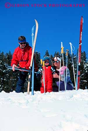 Stock Photo #2583: keywords -  boy child country cross family father fun mother nordic parent play recreation released share ski snow sport together vert winter