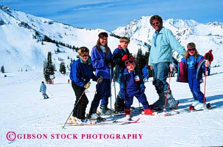 Stock Photo #2586: keywords -  alta children family father four fun horz large mother parent play portrait recreation released share ski smile snow sport together utah winter