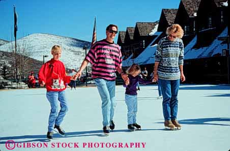 Stock Photo #2589: keywords -  children city family father fun horz ice mother parent park play recreation released share skate skating snow sport team together utah winter