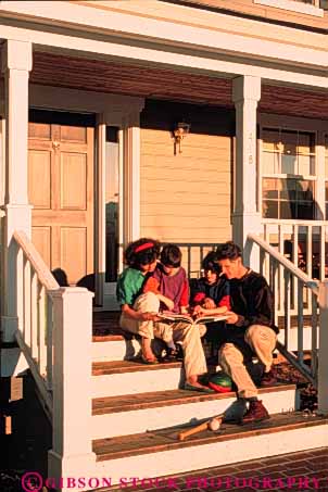 Stock Photo #3373: keywords - assist being book books boy boys brother calm chikldren child close closeness families family father help home homes housae husband kid kids learn leisure mother parent parents peaceful porch porches read reader readers reading reads relax relaxed relaxes relaxing released safety secure security share shared sharing son sons summer teach together vert warm well wife