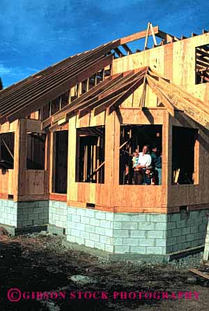 Stock Photo #2593: keywords - boy children construction family father frame home house inspect mother new released son vert wood