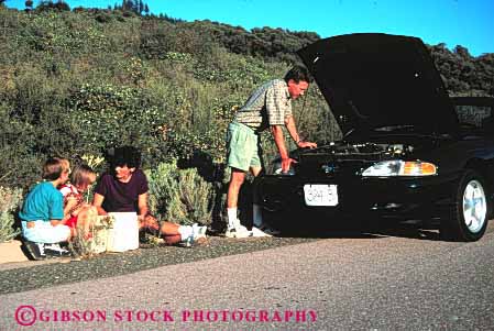 Stock Photo #2603: keywords -  auto break call car children disable distress down emergency expensive family frustration horz interruption parent parked quit released repair road service stop street summer together tow truck vehicle