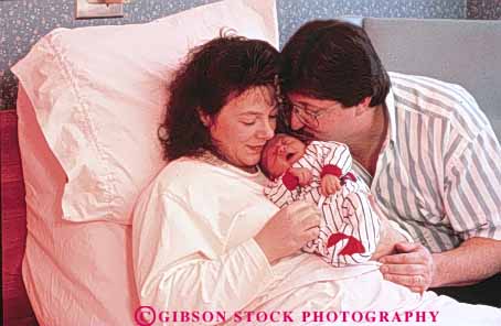 Stock Photo #3371: keywords - affection baby birth child couple families family grow happy horz hospital love newborn released together