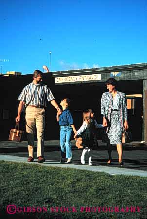 Stock Photo #2605: keywords - affection better children discharge emergency family hand happy health hold home hospital leave medical parent recover released reunite room together vert walk