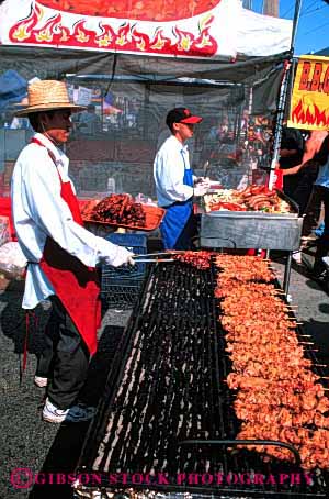 Stock Photo #2609: keywords -  asian barbecue bbq chicken cook fair food grill heat man meat sizzle vert white