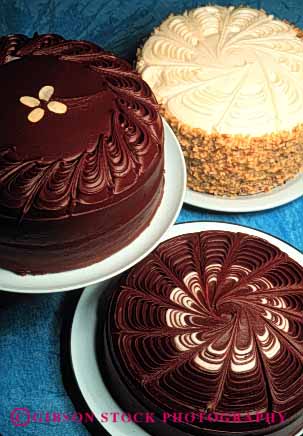 Stock Photo #2617: keywords - bake baked bakery cakes chocolate dessert fattening food frosting good goods item items layer pastries pastry round sweet sweets three vert