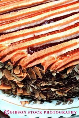 Stock Photo #2620: keywords - almond bake baked bakery cake dessert fattening food frosting good goods item items layer pastries pastry round slice sweet sweets vert