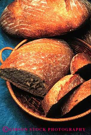 Stock Photo #2644: keywords -  bake bread fresh grain loaf slice vert