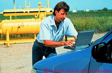 Stock Photo #3495: keywords - business businessman busy career casual commerce communicate computer craft duty earn educated employ employee employment equipment field hardware horz job labor laptop measure occupactions occupation outdoor paid pay paycheck payroll petroleum professional record relax released task technical technician trade trained vocation work worker