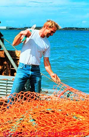 Stock Photo #3503: keywords - business busy california career commerce craft duty earn educated employ employee employment equipment eureka fisherman fix job labor marine mending net occupactions occupation outdoor paid pay paycheck payroll professional released resource sea summer task technical trade trained vert vocation work worker