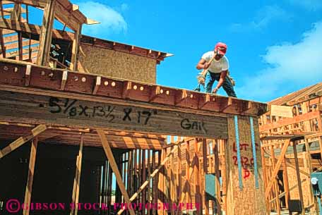 Stock Photo #3506: keywords - business busy career carpenter commerce construction craft dangerous duty earn educated employ employee employment ethnic frame hispanic home horz house job labor new occupactions occupation outdoor paid pay paycheck payroll professional released task technical timber trade trained vocation wood work worker