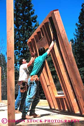 Stock Photo #2665: keywords -  build business career carpenters check construction cooperate employee frame heavy home house income industry job lift lumber men new occupation pay profession push raise released skill square teamwork vert vocation wall wood work